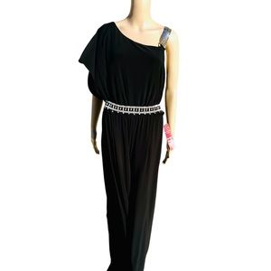 Black jumpsuit with asymmetrical neckline, half sleeve w/slit, metal strap